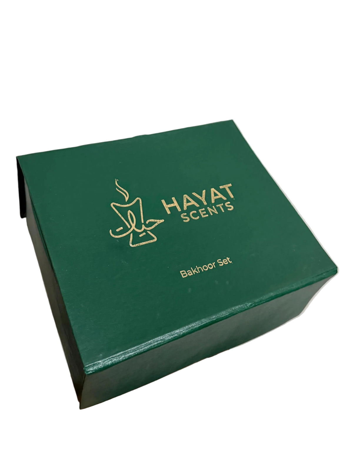 Side view of green Hayat Scents gift box