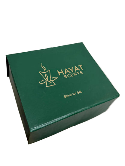 Side view of green Hayat Scents gift box